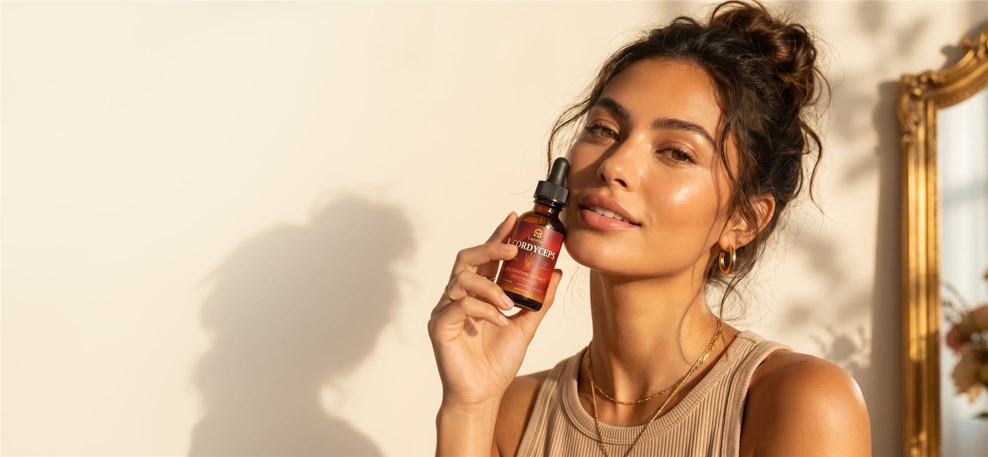 Woman holding a bottle of Lucetic Cordyceps mushroom extract