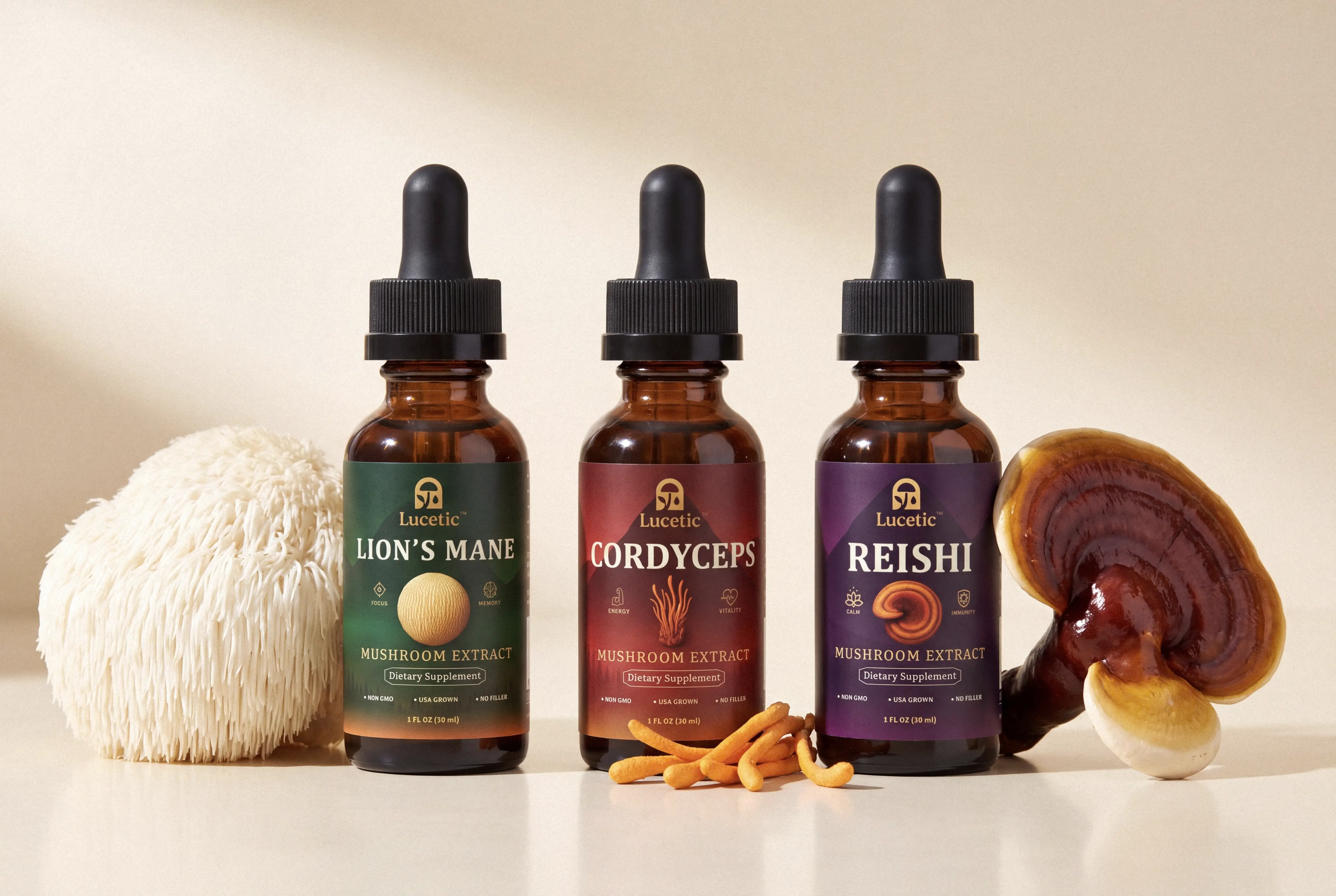 Lucetic Lion's Mane, Cordyceps, Reishi mushroom tincture extracts in a row with whole mushrooms